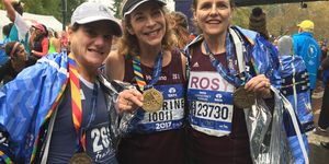 Women with medal - new york marathon